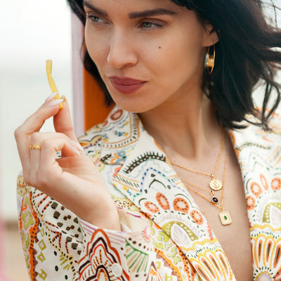 Model Wearing Gold Anchor Necklace
