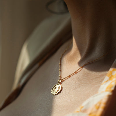 Horseshoe Charm Necklace In Gold