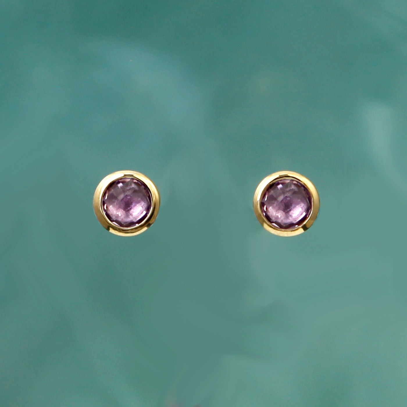 Photo of Gold and Amethyst Stud Earrings