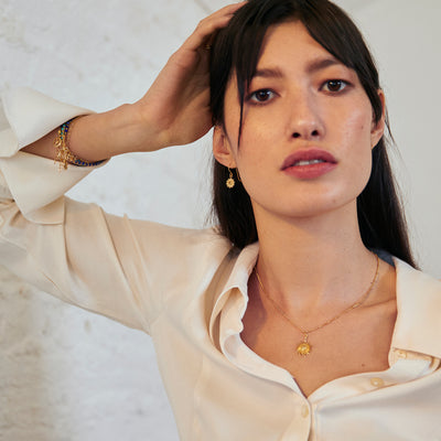 Model Wearing Gold and Citrine Sun Necklace