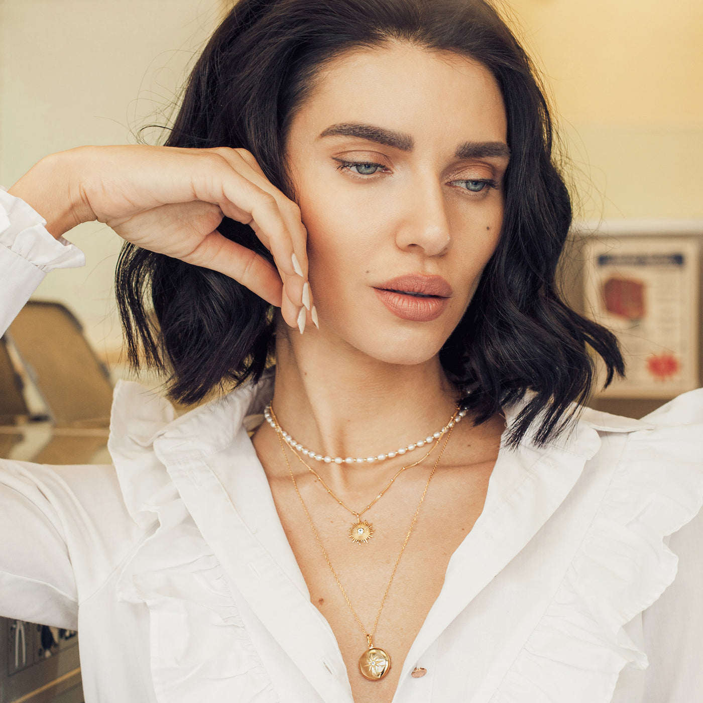 Model Wearing Gold Sun with White Topaz Necklace