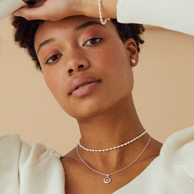 Model Wearing Silver Compass Necklace with November Birthstone