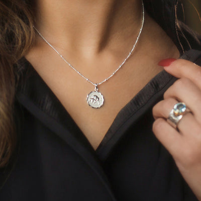 Model Wearing Silver Zodiac Necklace