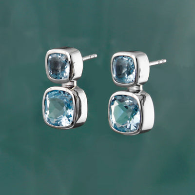 Photo of Silver & Blue Topaz Stud Earrings