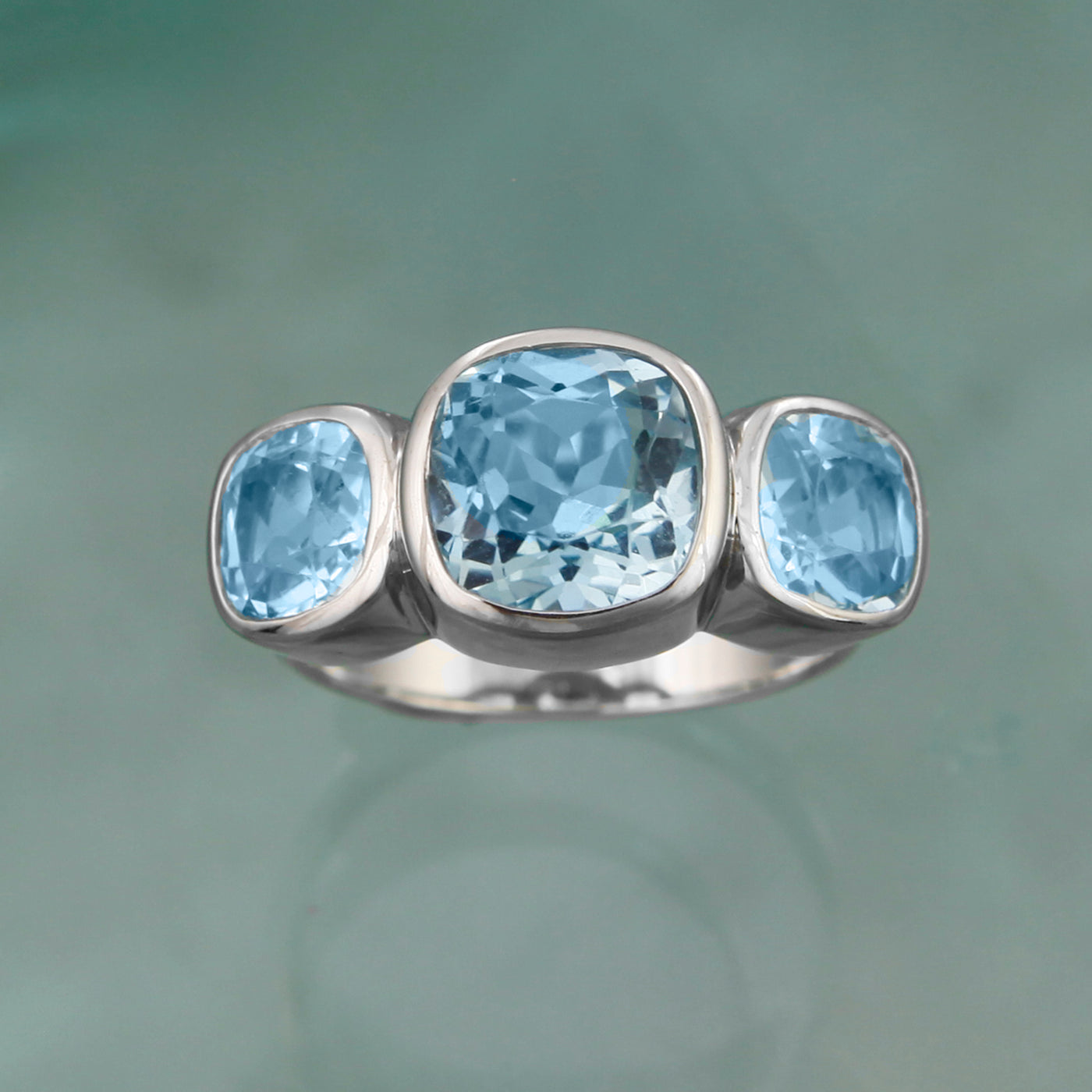Photo of Silver & Blue Topaz Three Stone Ring