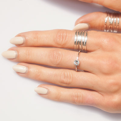 Model Wearing Silver High Wrap Ring