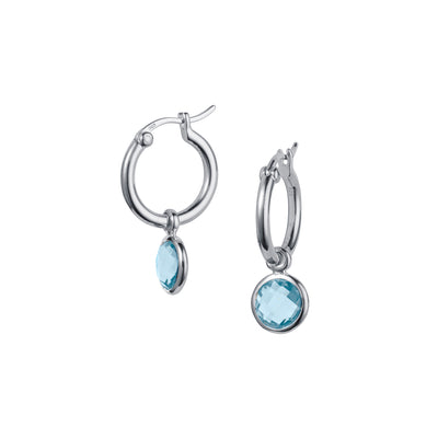Product Shot of Silver and Blue Topaz Huggie Hoop Earrings